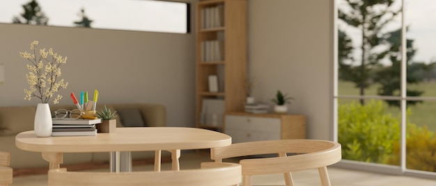 Copy space on a table with books stationery glasses and flower vase in minimal living room