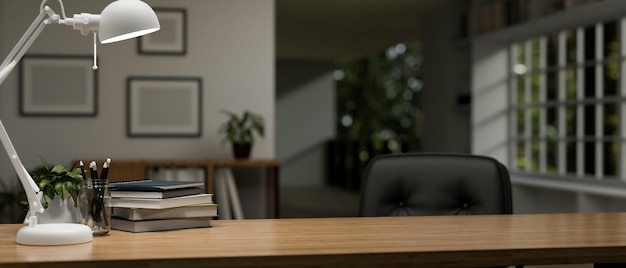 Copy space on a wooden desk in a modern home office room closeup image