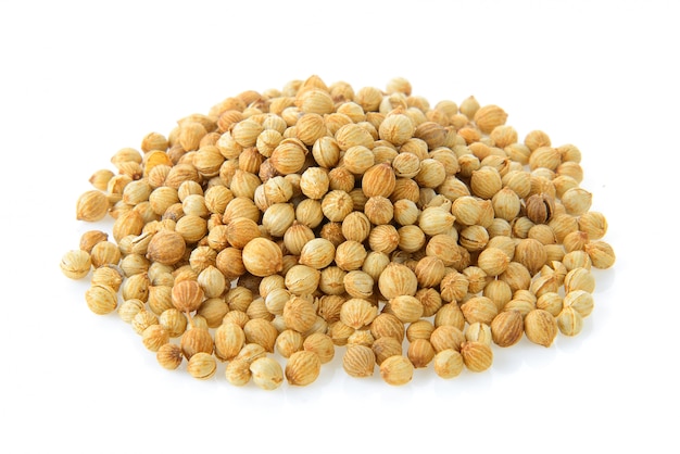 Coriander seeds on white 