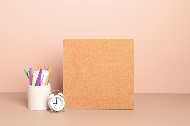 Cork board mockup desktop organizer with school stationary and office supplies