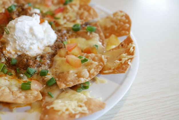 Corn chips nachos with fried minced meat