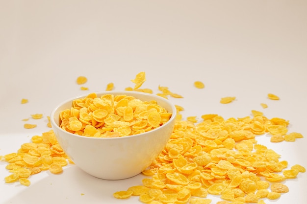 Corn flakes falling to the white bowl Motion Copyspace