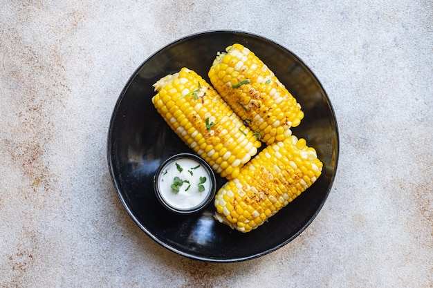 corn grilled corncob tasty food meal snack copy space food background rustic top view keto or paleo