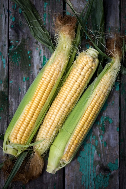 Corn on a wooden background