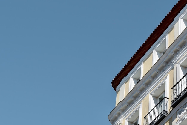 Corner of classical vintage building downtown Madrid Spain Spanish architectural style