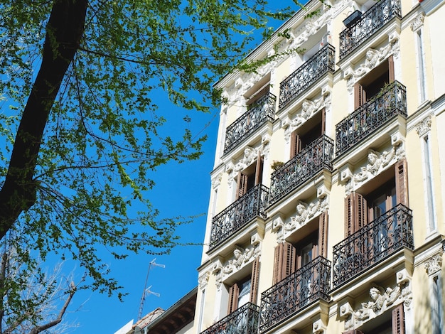 Corner of vintage house in downtown district of Madrid Spain Authentic Spanish architecture