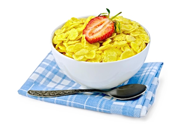 Cornflakes in bowl with strawberries