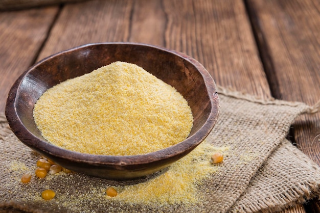 Cornmeal on rustic background