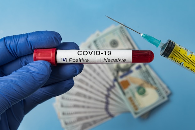 Coronavirus blood test Concept. Blood samples and vaccine 2019-nCov. Cure Covid-19