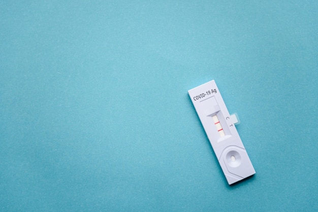 The coronavirus test shows a positive result Top view and copy space