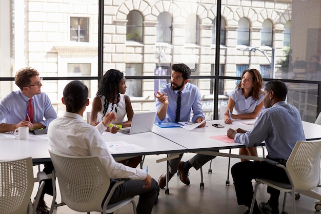 Corporate business team and manager in a meeting close up