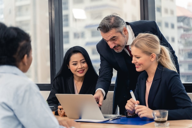 Corporate business team and manager in a meeting