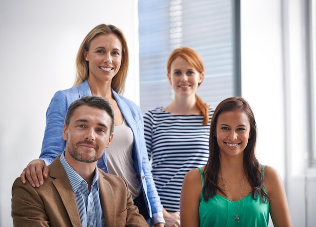 The corporate world Cropped shot of corporate businesspeople in the office