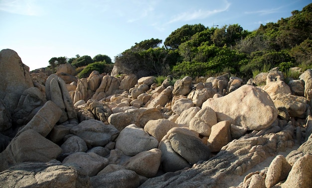 Corse rock sea and blue sky Landscape of a beach fulled with giant boulder of granite stone