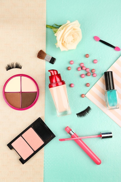 Cosmetic on colorful paper background