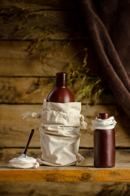 Cosmetic cream on wooden table