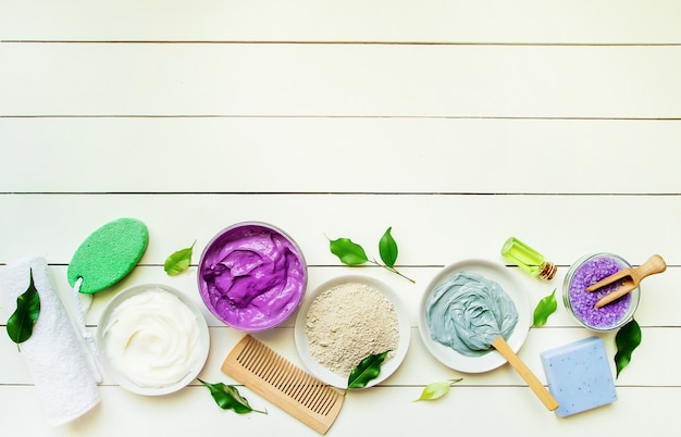 Cosmetic objects for spa procedures on a white background. Selective focus.