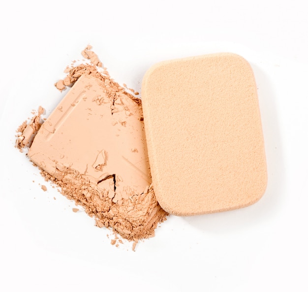 Cosmetic powder on white background