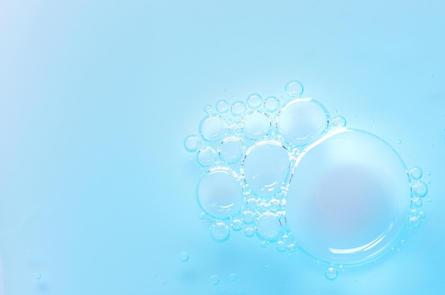 Cosmetic serum or body gel Textured background with bubbles Copy space