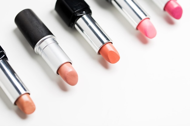 cosmetics, makeup and beauty concept - close up of lipsticks range