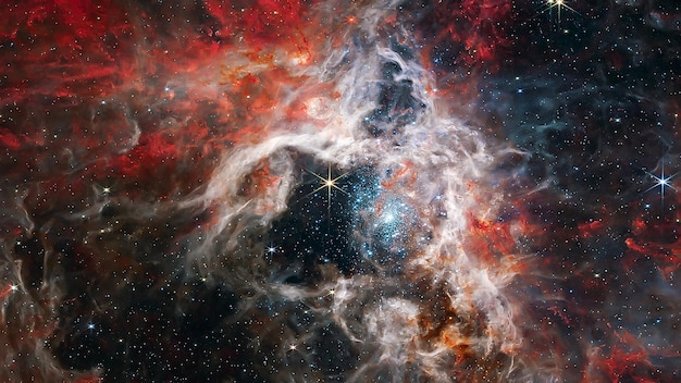 Cosmic Tarantula Nebula in space. James Webb telescope. Elements of this image furnished by NASA.