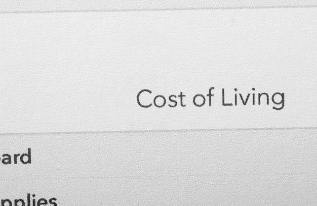 Cost of living refers to the amount of money that is required to maintain a certain standard of living in a particular geographic area