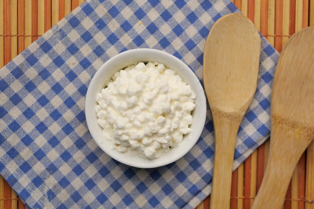 Cottage cheese in a bowl on table