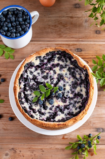 Cottage cheese casserole baked with blueberry Curd casserole with fresh berries on table Top view