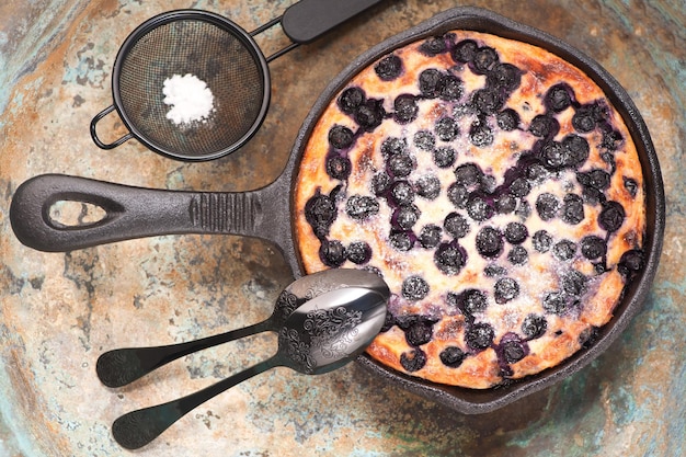 Cottage cheese casserole Cheesecake with blueberries in pan top view