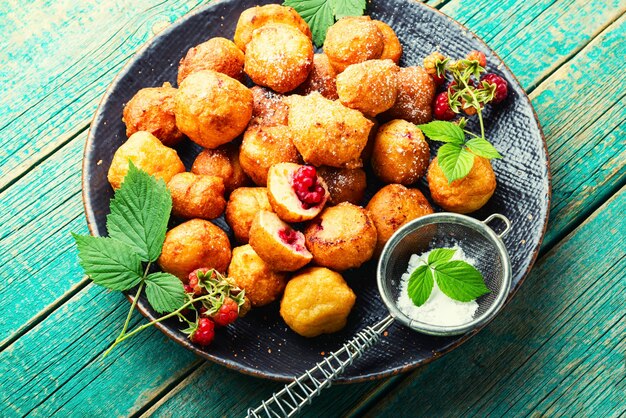 Cottage cheese donuts with raspberries