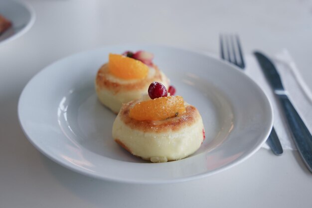 Cottage cheese fritters served with fruits