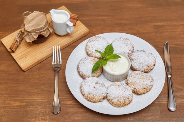 Cottage cheese pancakes or fritters. Traditional Russian and Ukrainian cuisine