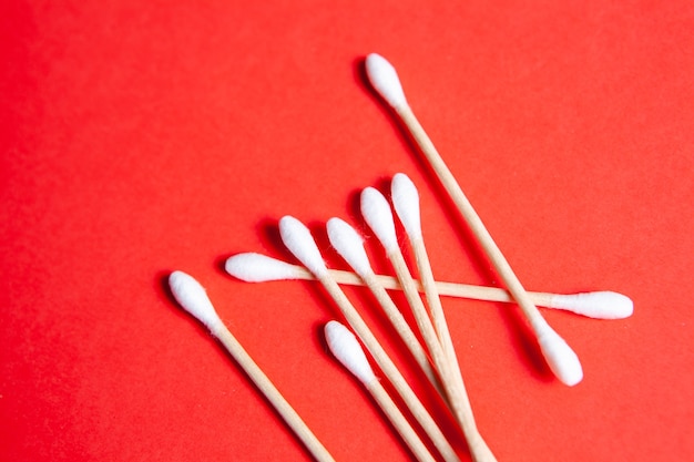 Cotton Bud on red background