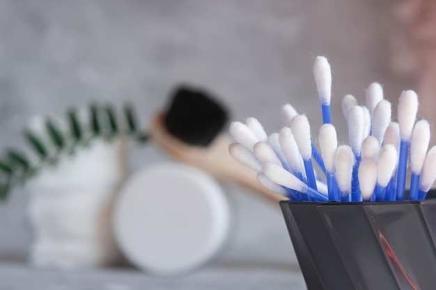 Cotton buds blue color close-up, macro photo, care products for women, the concept of skin