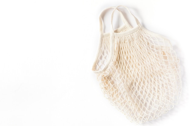 Cotton eco mesh bag on white background. Eco-friendly concept