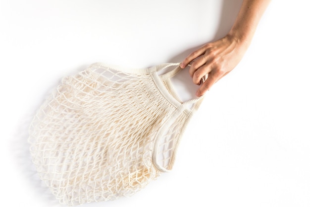 Cotton eco mesh bag on white background. Eco-friendly concept