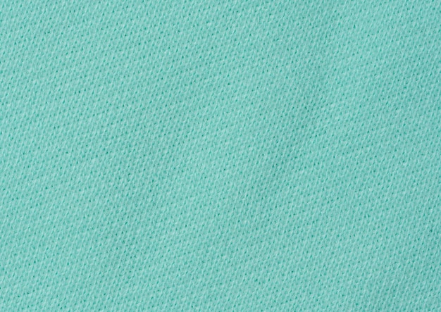 Cotton mintcolored fabric texture for making clothes