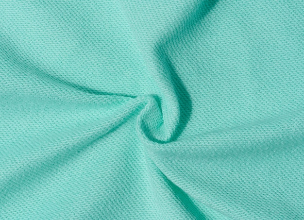 Cotton mintcolored fabric texture for making clothes