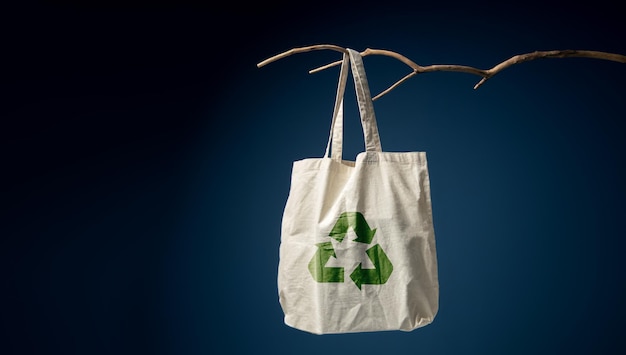 Cotton Recycling Bag Hanging on Wooden Coat Rack Zero Waste Products Environment Ecology Care Renewable Concepts