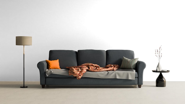 a couch with a blanket and pillows on it