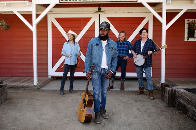 Country music band singing outdoors