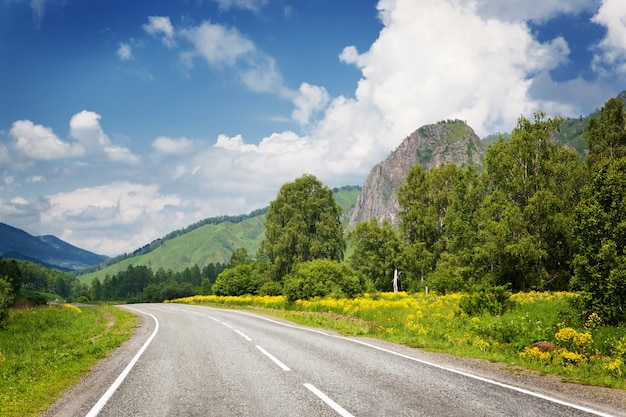 Country road highway to mountains