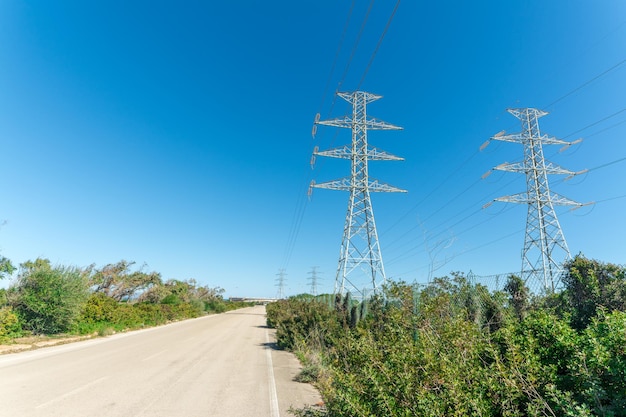 Country road near elettric pylons