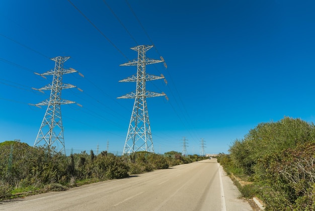 Country road near elettric pylons