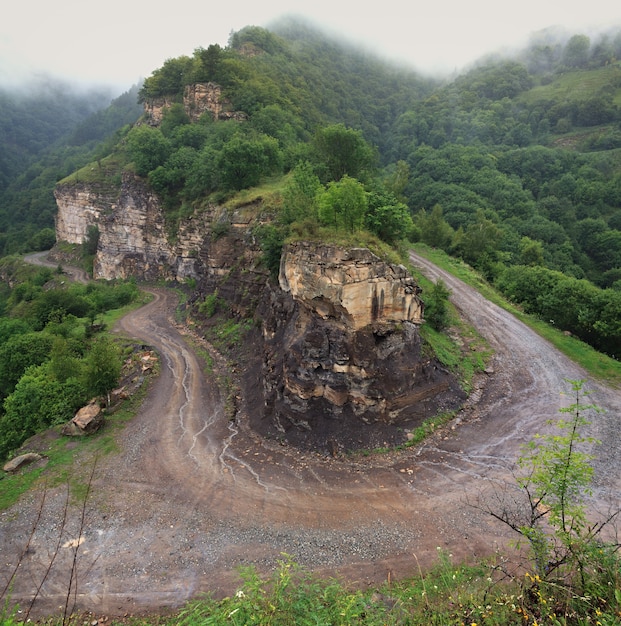 Country road without asphalt in the mountains