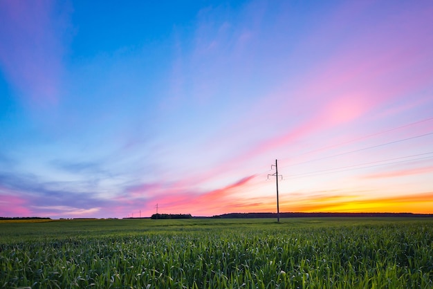 Countryside landscape under scenic sky at dawn