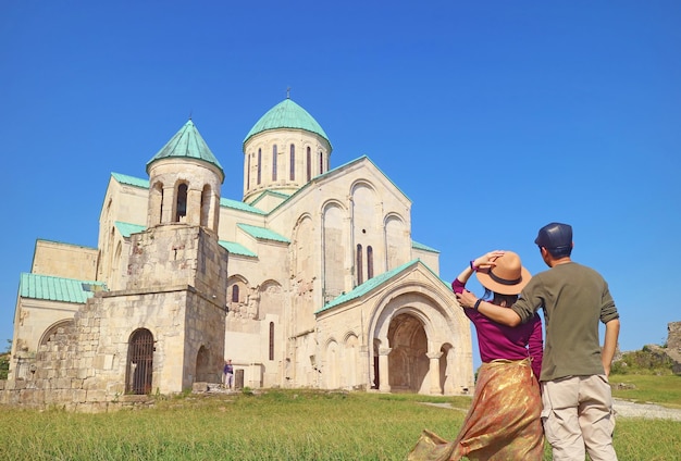 Couple Being Impressed by Bagrati Cathedral Gorgeous Medieval Church in Kutaisi Georgia