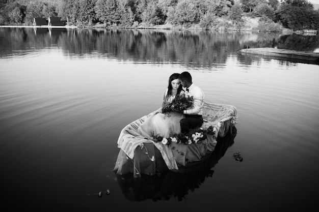 Couple in boat on lake