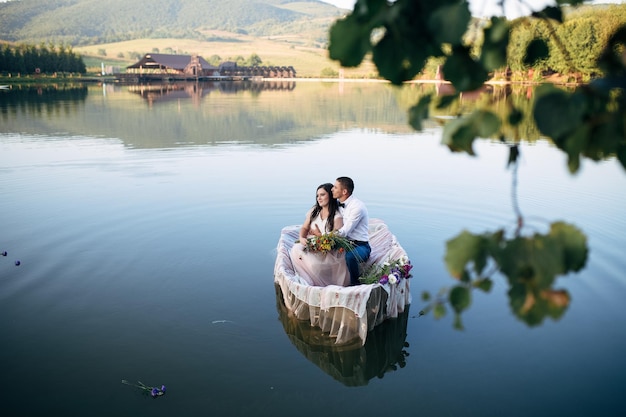 Couple in boat on lake