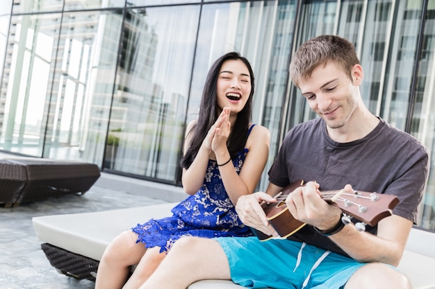 couple of caucasian and asian lover play fun with happiness and joyful